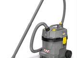 a gray vacuum cleaner with a yellow handle and a gray hose