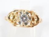 an image of a gold ring with a diamond in it