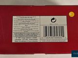 a red box with a barcode on the side of it