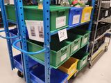 a large rack with many different colored bins on it
