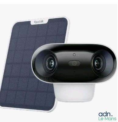 two cameras sitting next to each other on top of a white surface