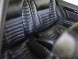 an image of a black leather seat in a car
