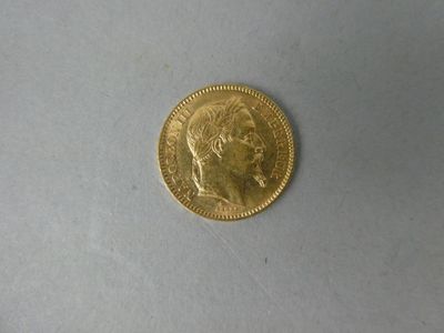 a gold coin with a picture of a man on it