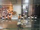a glass display case with various items inside of it