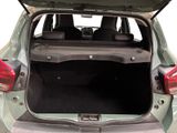 the back of a car with its trunk open and the back seats folded down