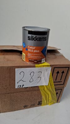 un pot de peinture posé sur une boîte avec une étiquette de prix