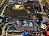 a picture of a car engine in the back of the car
