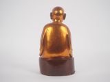 an image of a gold buddha statue on a white background