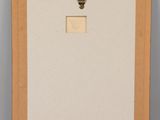 an image of a picture frame with a picture hanging on a wall