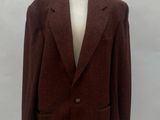 an image of a suit on a mannequin stand