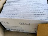 a box full of papers sitting on a table