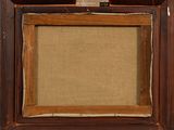 an old picture frame with a piece of paper taped around it