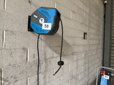 an image of a pay phone attached to a wall