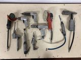 a lot of tools that are sitting on a table