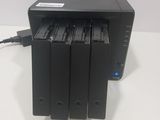 a small black device that is connected to a charger