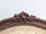 a wooden frame with a floral pattern on it