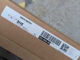 a box with a barcode on it sitting on the ground