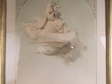 painting of a woman holding a dove on a cloud in a gold frame