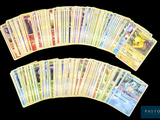 a lot of pokemon cards on a black background
