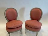 pair of vintage french style chairs with pink upholstered cushions