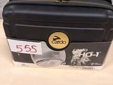 a black suitcase sitting on a counter with a price tag on it