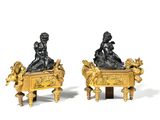 paire de figurines en bronze représentant une femme et un enfant, sur un carton