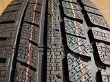 a close up of a car tire with colorful lines on the tread