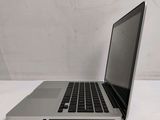 a laptop computer that is sitting on a table
