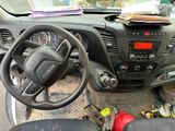 a car dashboard with a steering wheel and a steering control