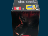 batman the dark knight lego figure in a box on a blue background