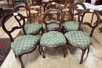 SUITE DE SIX CHAISES en acajou et placage d'acajou