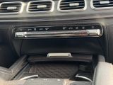 a cell phone in the center of a car