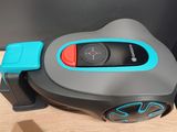a remote control that is sitting on a table
