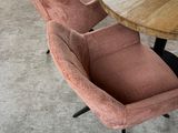 a table and chairs in a room with a table and chairs