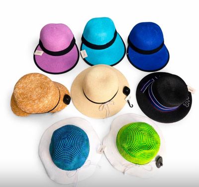 several hats are arranged in a circle on a white surface