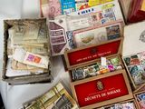 many different types of stamps in a box on a table