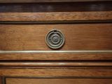 a close up of a drawer with a knob on it