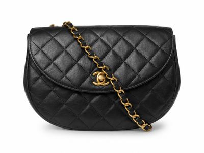 a chanel black quilted leather shoulder bag with gold chain