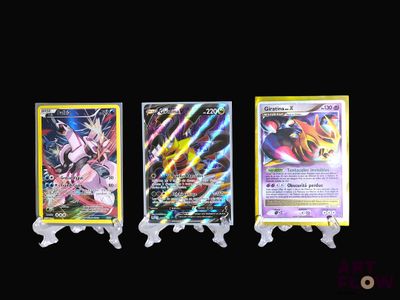 three different types of pokemon cards on a black background