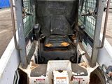 an image of a forklift with a seat in the back of it