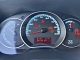 a close up of a speedometer in a car