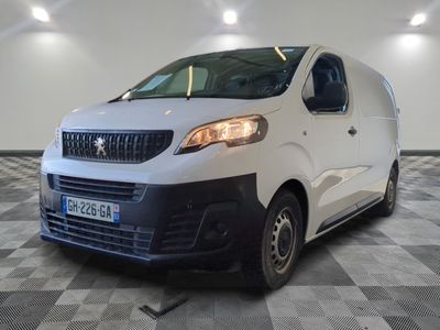a white van that is parked in a room