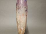 a vase that is sitting on a table in a room