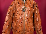 an image of a brown leather jacket on a mannequin stand