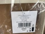 a label on the back of a box that is wrapped in plastic