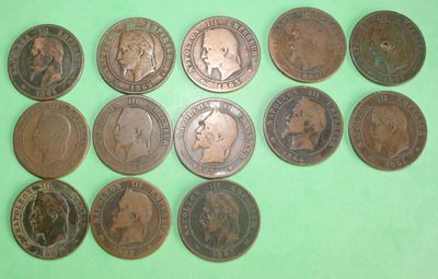 a close up of a bunch of coins on a green surface