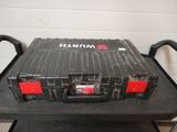 a black tool box on a black cart in a garage