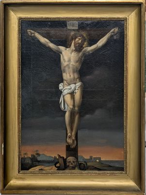 une image représentant un tableau de Jésus sur la croix, avec un crâne au premier plan