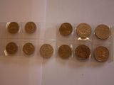 a lot of coins that are sitting on a table