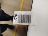 a price tag attached to the side of a white car
